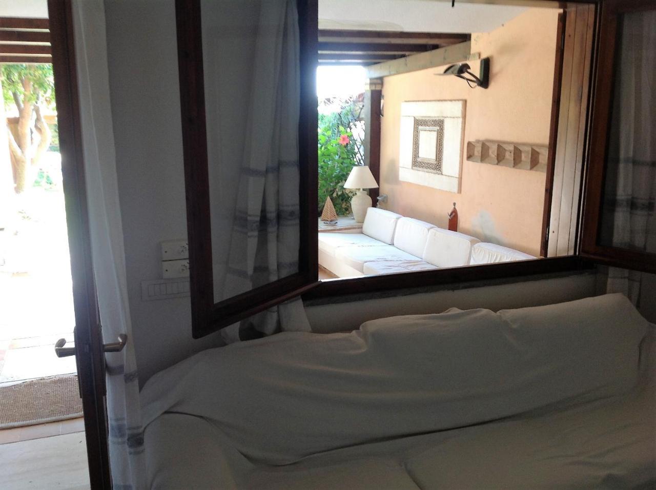 Casa Vacanza Porto Luna 68 Вилласимиус Экстерьер фото